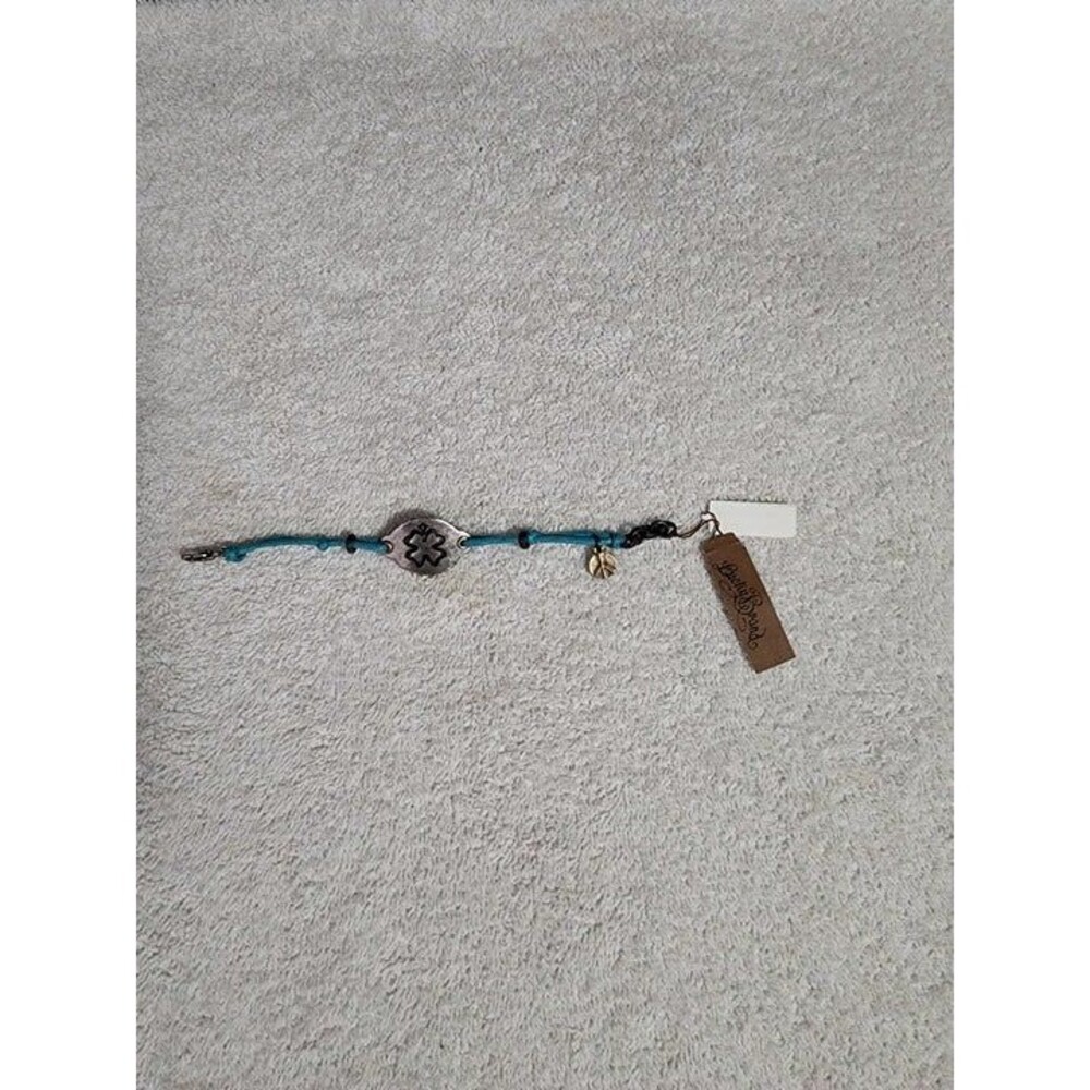 Lucky Brand leather shampoo k peace sign bracelet NEW